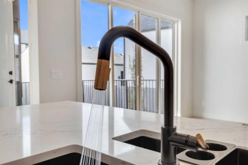 342 Normandy Drive Sw, Calgary, AB - Indoor Photo Showing Kitchen