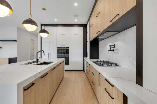 342 Normandy Drive Sw, Calgary, AB - Indoor Photo Showing Kitchen With Upgraded Kitchen