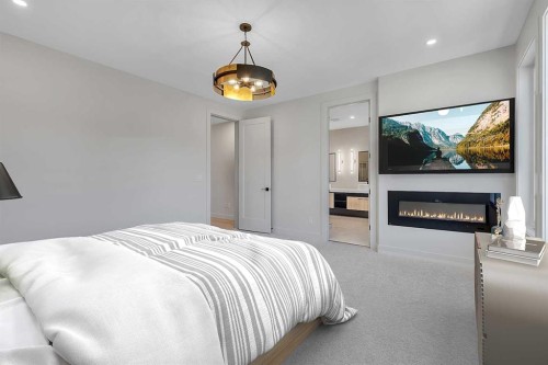 342 Normandy Drive Sw, Calgary, AB - Indoor Photo Showing Bedroom With Fireplace