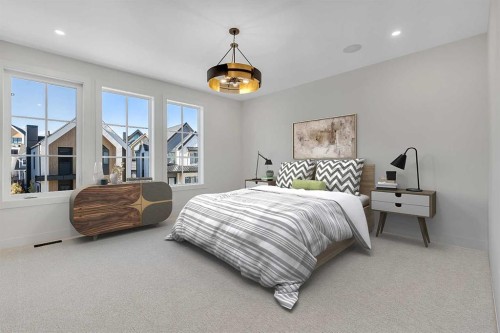 342 Normandy Drive Sw, Calgary, AB - Indoor Photo Showing Bedroom