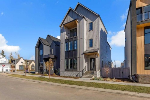342 Normandy Drive Sw, Calgary, AB - Outdoor With Facade