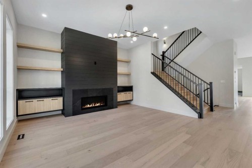 342 Normandy Drive Sw, Calgary, AB - Indoor With Fireplace