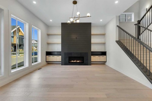 342 Normandy Drive Sw, Calgary, AB - Indoor With Fireplace