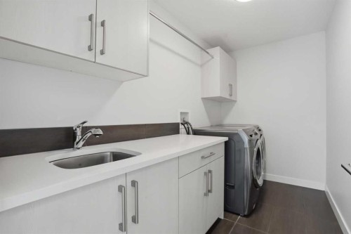 2312 Westmount Road Nw, Calgary, AB - Indoor Photo Showing Laundry Room