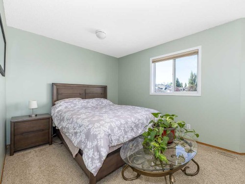 119 Mt Douglas Manor Se, Calgary, AB - Indoor Photo Showing Bedroom