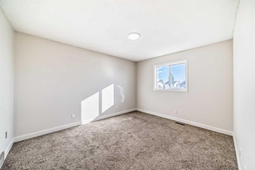 120 Martinview Close Ne, Calgary, AB - Indoor Photo Showing Other Room