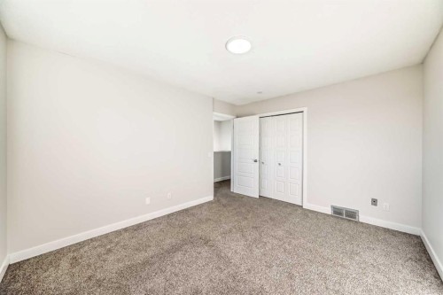 120 Martinview Close Ne, Calgary, AB - Indoor Photo Showing Other Room