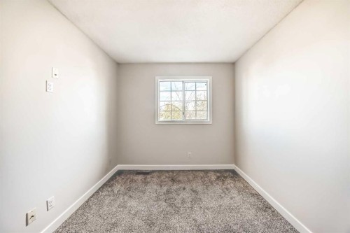 120 Martinview Close Ne, Calgary, AB - Indoor Photo Showing Other Room