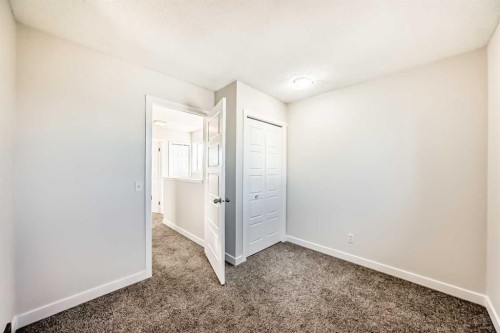 120 Martinview Close Ne, Calgary, AB - Indoor Photo Showing Other Room