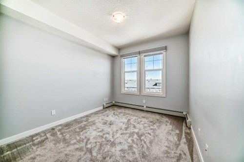 417-2300 Evanston Square Nw, Calgary, AB - Indoor Photo Showing Other Room