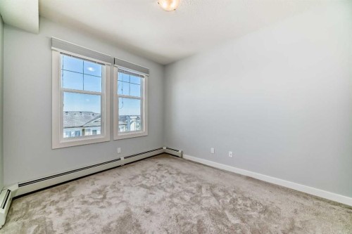 417-2300 Evanston Square Nw, Calgary, AB - Indoor Photo Showing Other Room