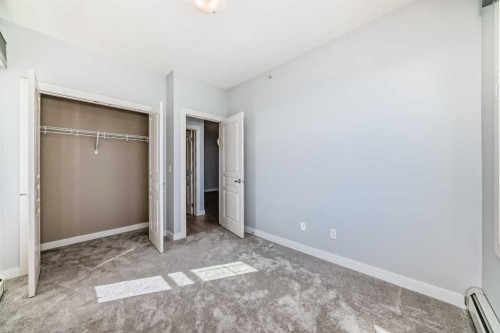 417-2300 Evanston Square Nw, Calgary, AB - Indoor Photo Showing Other Room