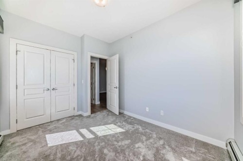 417-2300 Evanston Square Nw, Calgary, AB - Indoor Photo Showing Other Room