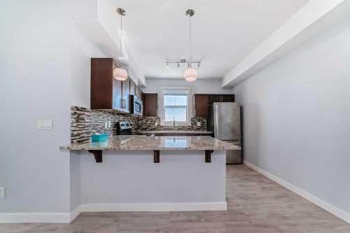 417-2300 Evanston Square Nw, Calgary, AB - Indoor Photo Showing Kitchen