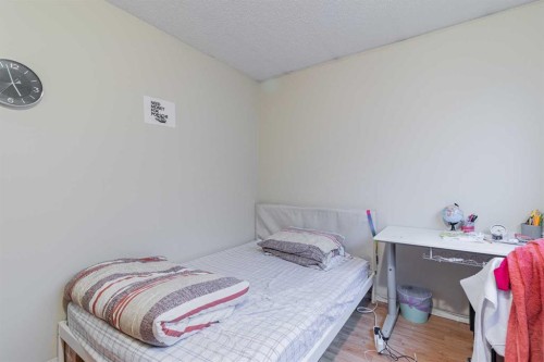 143 Castlegrove Road Ne, Calgary, AB - Indoor Photo Showing Bedroom