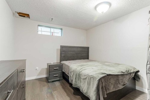 143 Castlegrove Road Ne, Calgary, AB - Indoor Photo Showing Bedroom