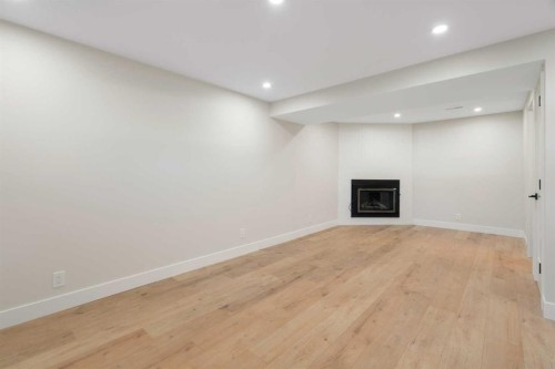 45 Alpine Crescent Se, Airdrie, AB - Indoor With Fireplace