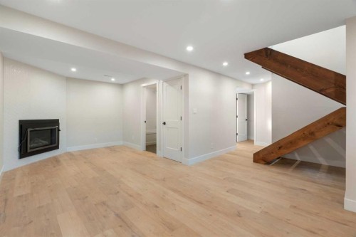 45 Alpine Crescent Se, Airdrie, AB - Indoor With Fireplace