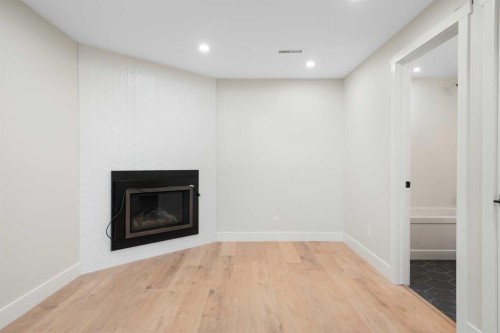 45 Alpine Crescent Se, Airdrie, AB - Indoor With Fireplace