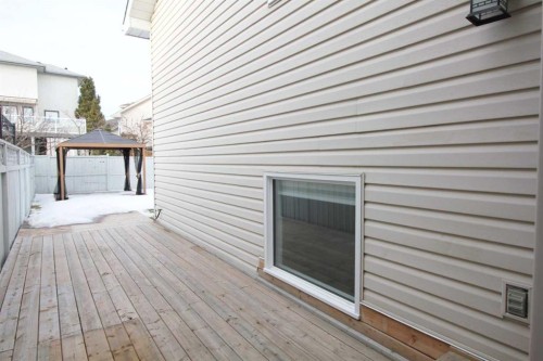215 Hidden Vale Place Nw, Calgary, AB - Outdoor With Deck Patio Veranda With Exterior