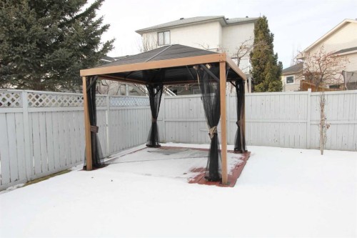 215 Hidden Vale Place Nw, Calgary, AB - Outdoor