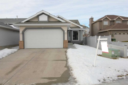 215 Hidden Vale Place Nw, Calgary, AB - Outdoor With Facade