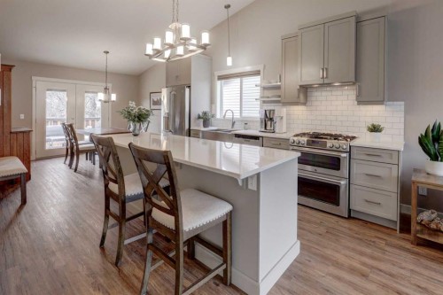 33 Willowbrook Crescent Nw, Airdrie, AB - Indoor Photo Showing Kitchen With Upgraded Kitchen