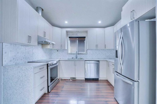 62 Taracove Estate Drive Ne, Calgary, AB - Indoor Photo Showing Kitchen With Upgraded Kitchen