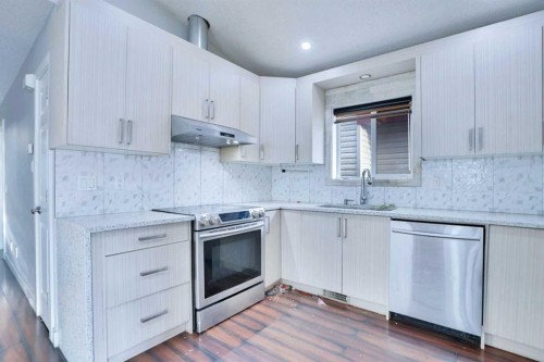 62 Taracove Estate Drive Ne, Calgary, AB - Indoor Photo Showing Kitchen With Upgraded Kitchen