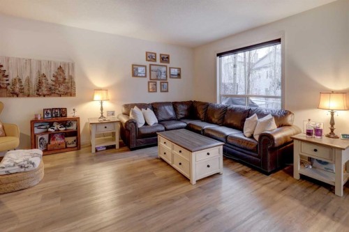 89 Cougar Ridge View Sw, Calgary, AB - Indoor Photo Showing Living Room