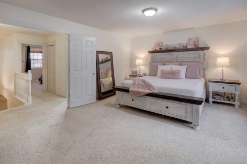 89 Cougar Ridge View Sw, Calgary, AB - Indoor Photo Showing Bedroom