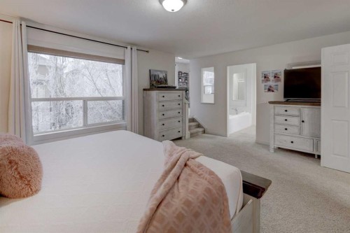 89 Cougar Ridge View Sw, Calgary, AB - Indoor Photo Showing Bedroom