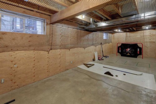 89 Cougar Ridge View Sw, Calgary, AB - Indoor Photo Showing Basement
