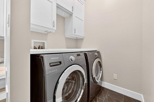 5318 Copperfield Gate Se, Calgary, AB - Indoor Photo Showing Laundry Room