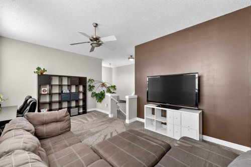 5318 Copperfield Gate Se, Calgary, AB - Indoor Photo Showing Living Room