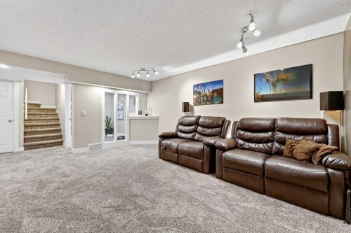 5318 Copperfield Gate Se, Calgary, AB - Indoor Photo Showing Living Room