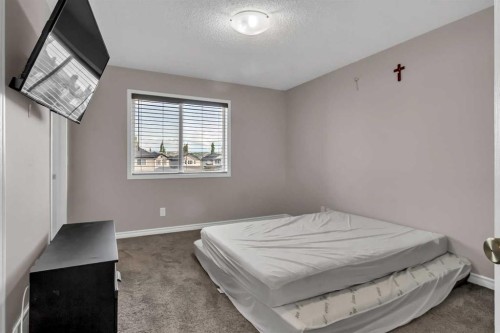 178 Evansmeade Common Nw, Calgary, AB - Indoor Photo Showing Bedroom