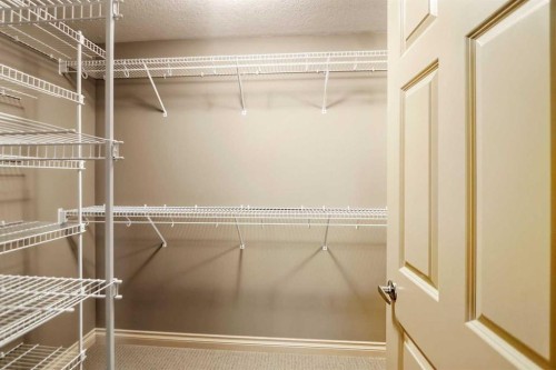 55 Billy Haynes Trail, Okotoks, AB - Indoor With Storage