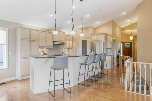 55 Billy Haynes Trail, Okotoks, AB - Indoor Photo Showing Kitchen With Stainless Steel Kitchen With Upgraded Kitchen