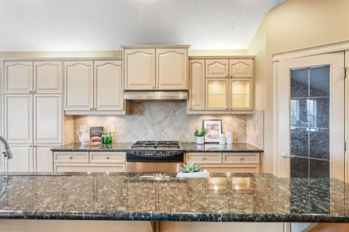 55 Billy Haynes Trail, Okotoks, AB - Indoor Photo Showing Kitchen With Upgraded Kitchen