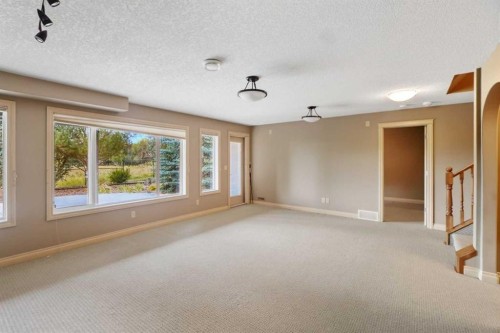 55 Billy Haynes Trail, Okotoks, AB - Indoor Photo Showing Other Room