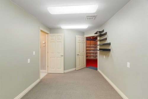 55 Billy Haynes Trail, Okotoks, AB - Indoor Photo Showing Other Room