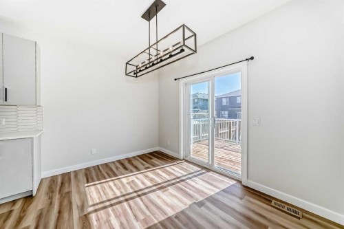 105 Creekside Way Sw, Calgary, AB - Indoor Photo Showing Other Room
