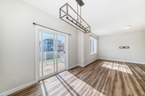 105 Creekside Way Sw, Calgary, AB - Indoor Photo Showing Other Room