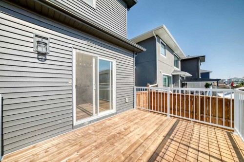 105 Creekside Way Sw, Calgary, AB - Outdoor With Deck Patio Veranda With Exterior