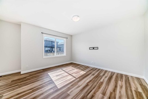 105 Creekside Way Sw, Calgary, AB - Indoor Photo Showing Other Room