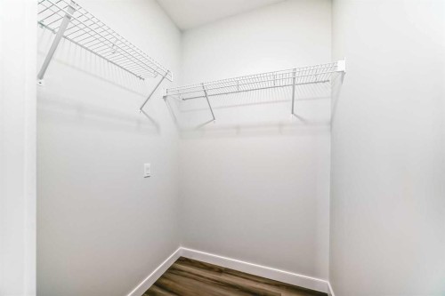 105 Creekside Way Sw, Calgary, AB - Indoor With Storage