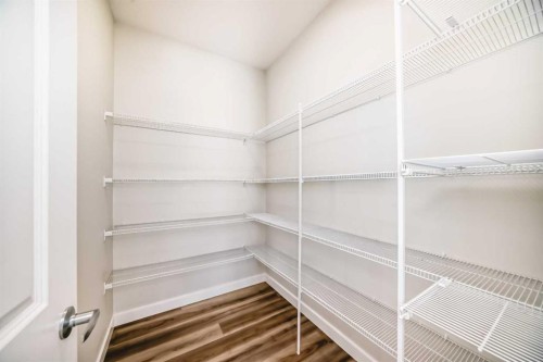 105 Creekside Way Sw, Calgary, AB - Indoor With Storage