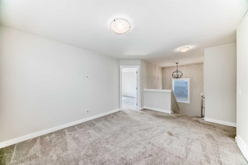 105 Creekside Way Sw, Calgary, AB - Indoor Photo Showing Other Room