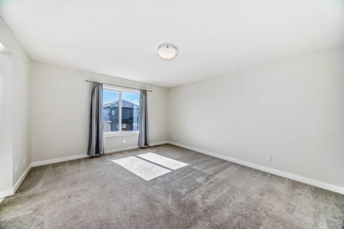 105 Creekside Way Sw, Calgary, AB - Indoor Photo Showing Other Room